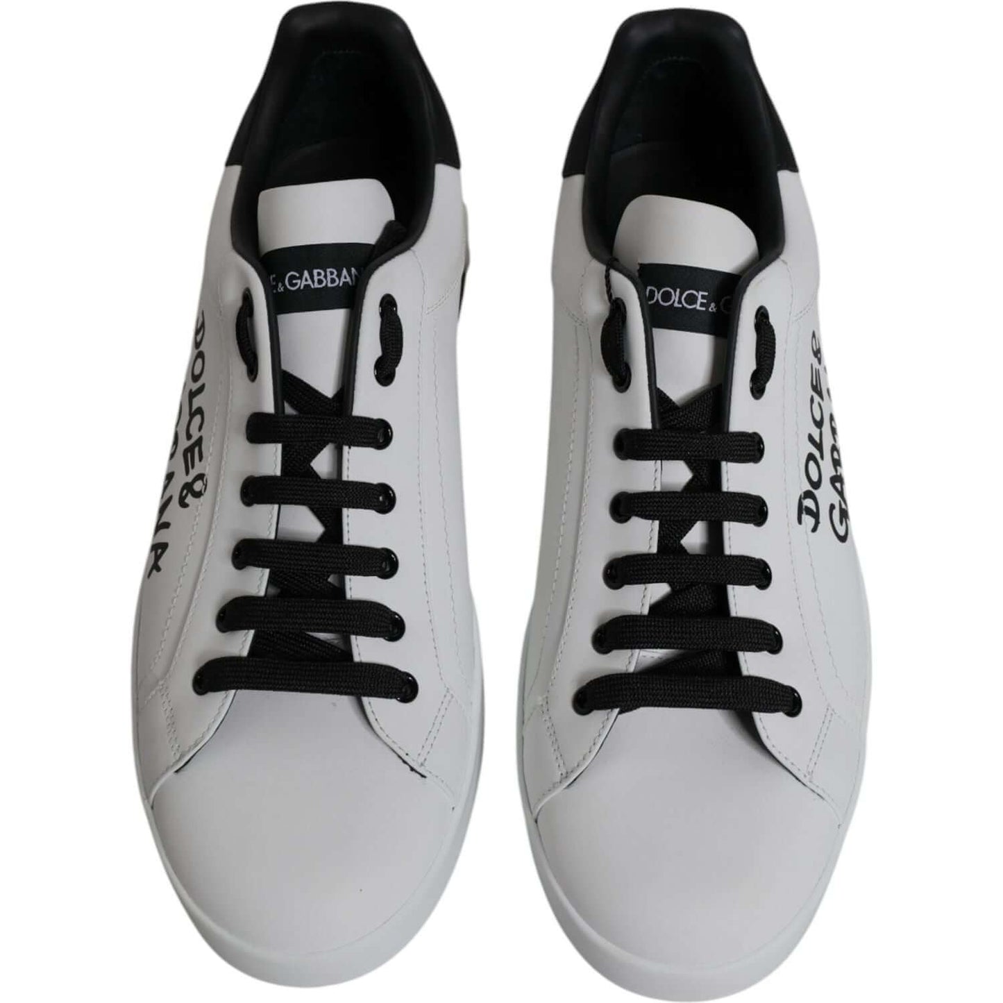 Dolce & Gabbana Portofino sneakers, white leather with black logo and laces, stylish Italian design, rubber sole, lightly preowned condition.