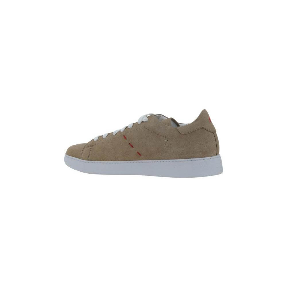 Side view of Kiton leather sneakers with suede upper, lace-up closure, and flat sole.