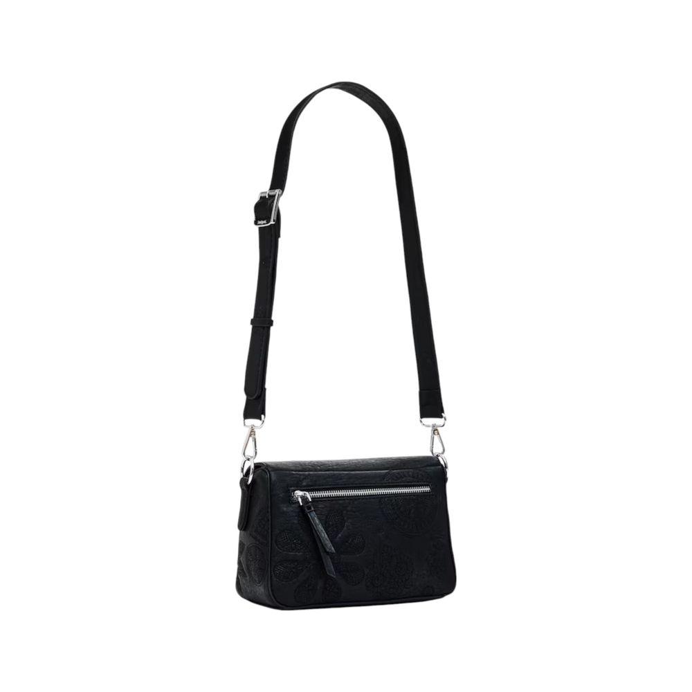 Desigual black polyethylene handbag from the Spring/Summer collection, featuring adjustable strap and 100% polyurethane composition.