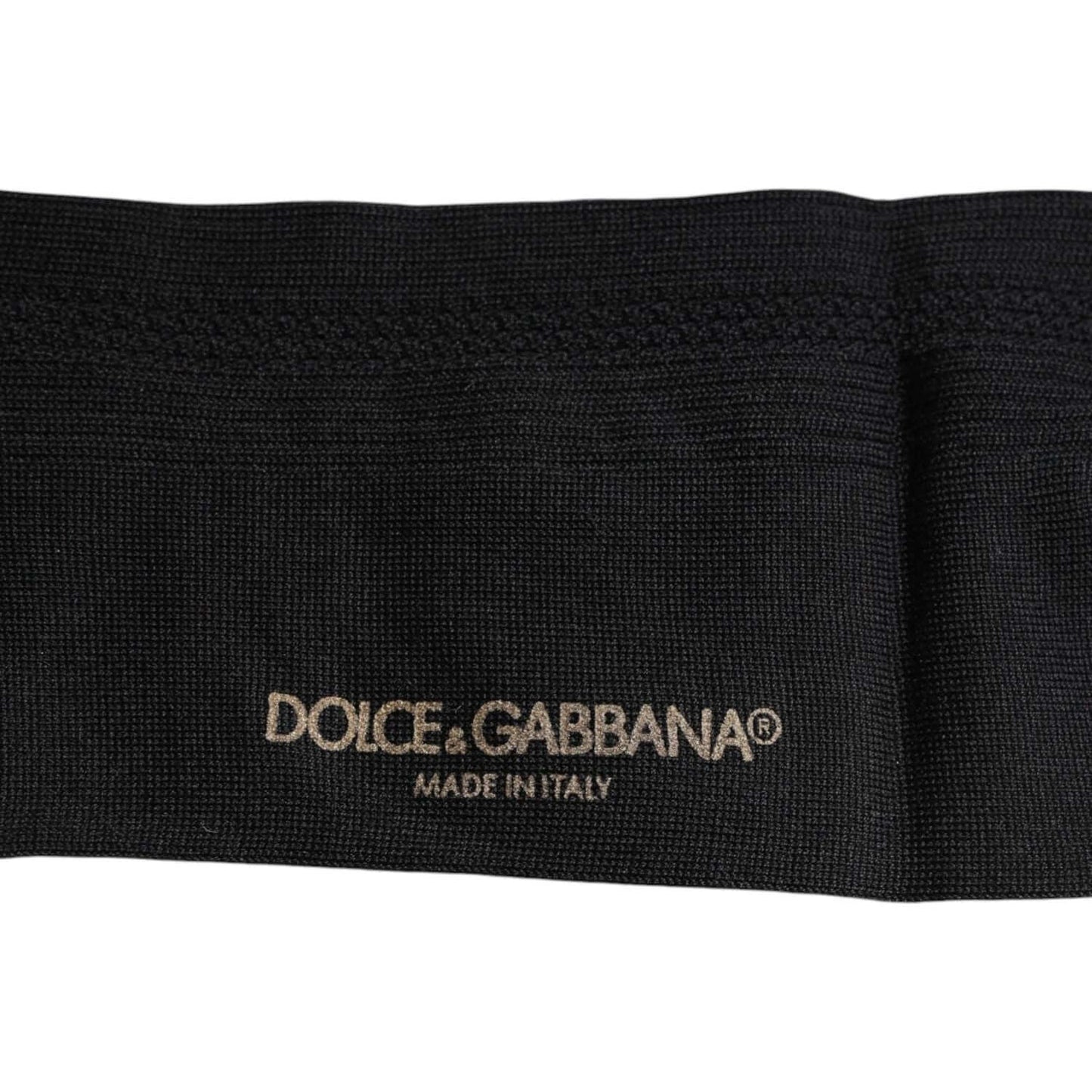 Dolce & Gabbana black mid calf men's socks with logo detail, made in Italy, showcasing stretch fabric and elegant design.