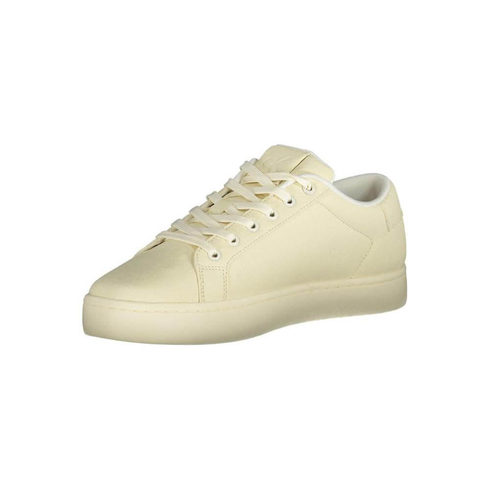 Cream-colored casual sneaker with lace-up design on a white background.