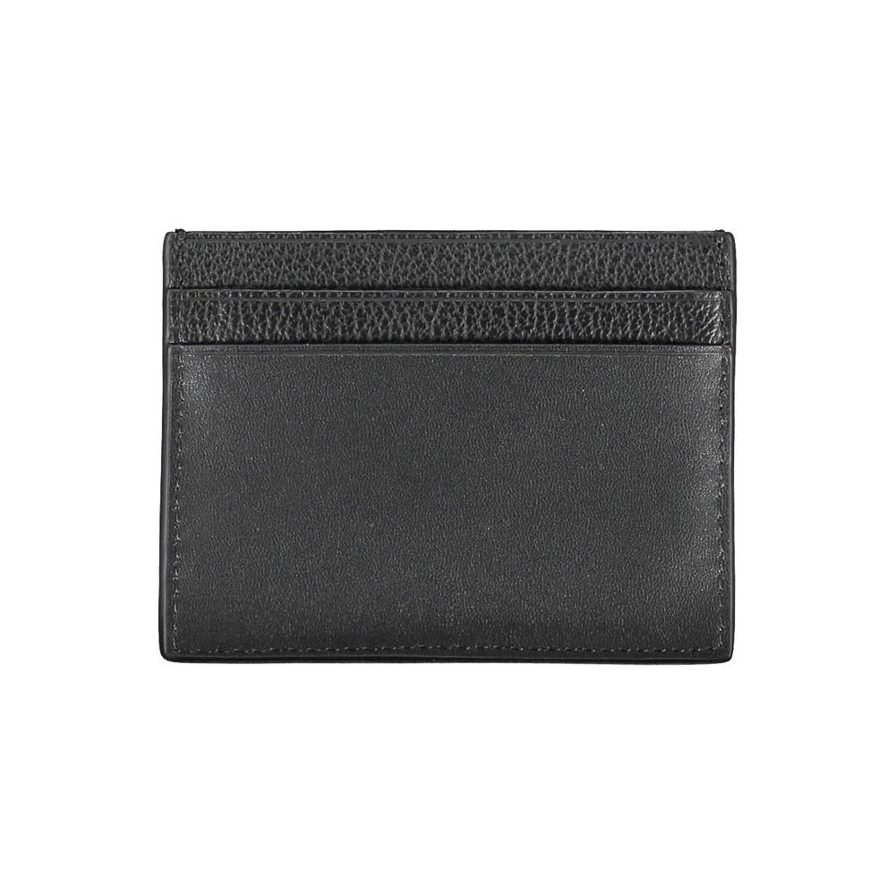 Calvin Klein elegant black leather card holder with central pocket and logo, perfect for minimalists seeking style and convenience.