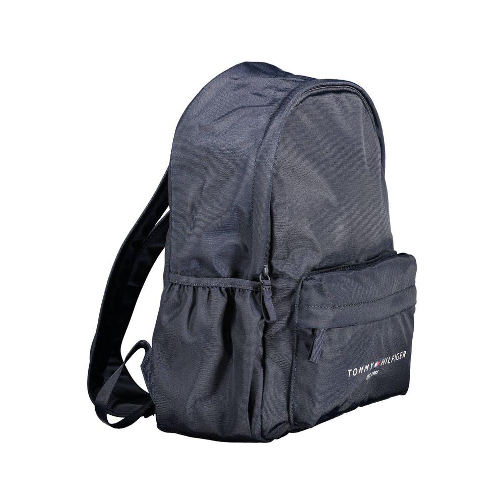 Tommy Hilfiger blue polyester men's backpack with multiple pockets and adjustable straps, featuring brand logo and sustainable material.