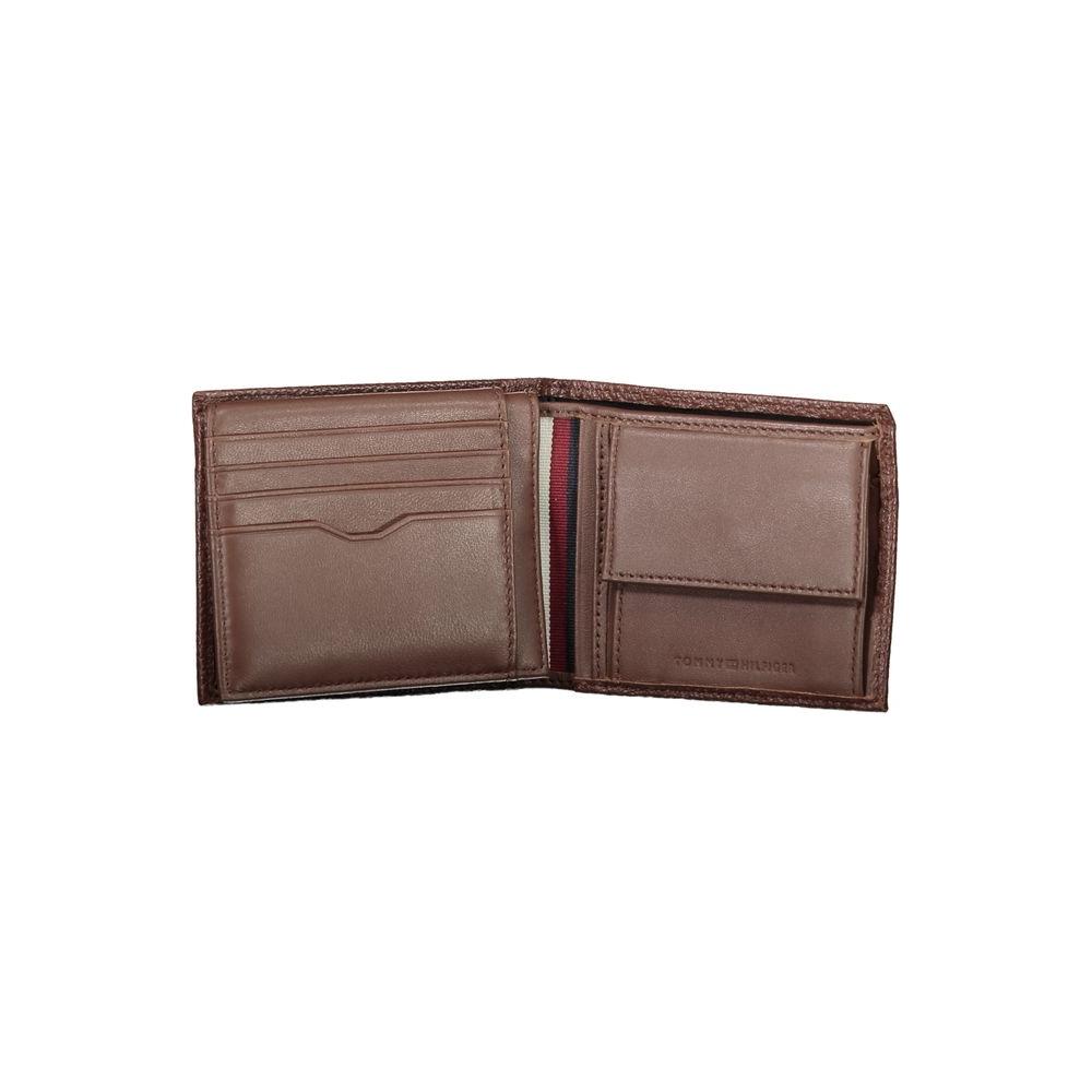 Tommy Hilfiger elegant brown leather bifold wallet with card slots and coin purse, stylish design with logo accents.