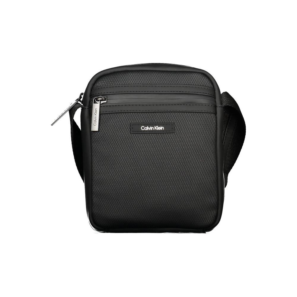 Calvin Klein black polyester men's shoulder bag with adjustable strap and external pockets, featuring a sleek, modern design.