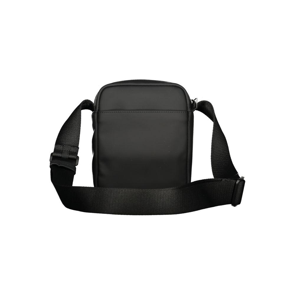 Calvin Klein black polyester men's shoulder bag with adjustable strap and signature logo, practical for daily use and travel.