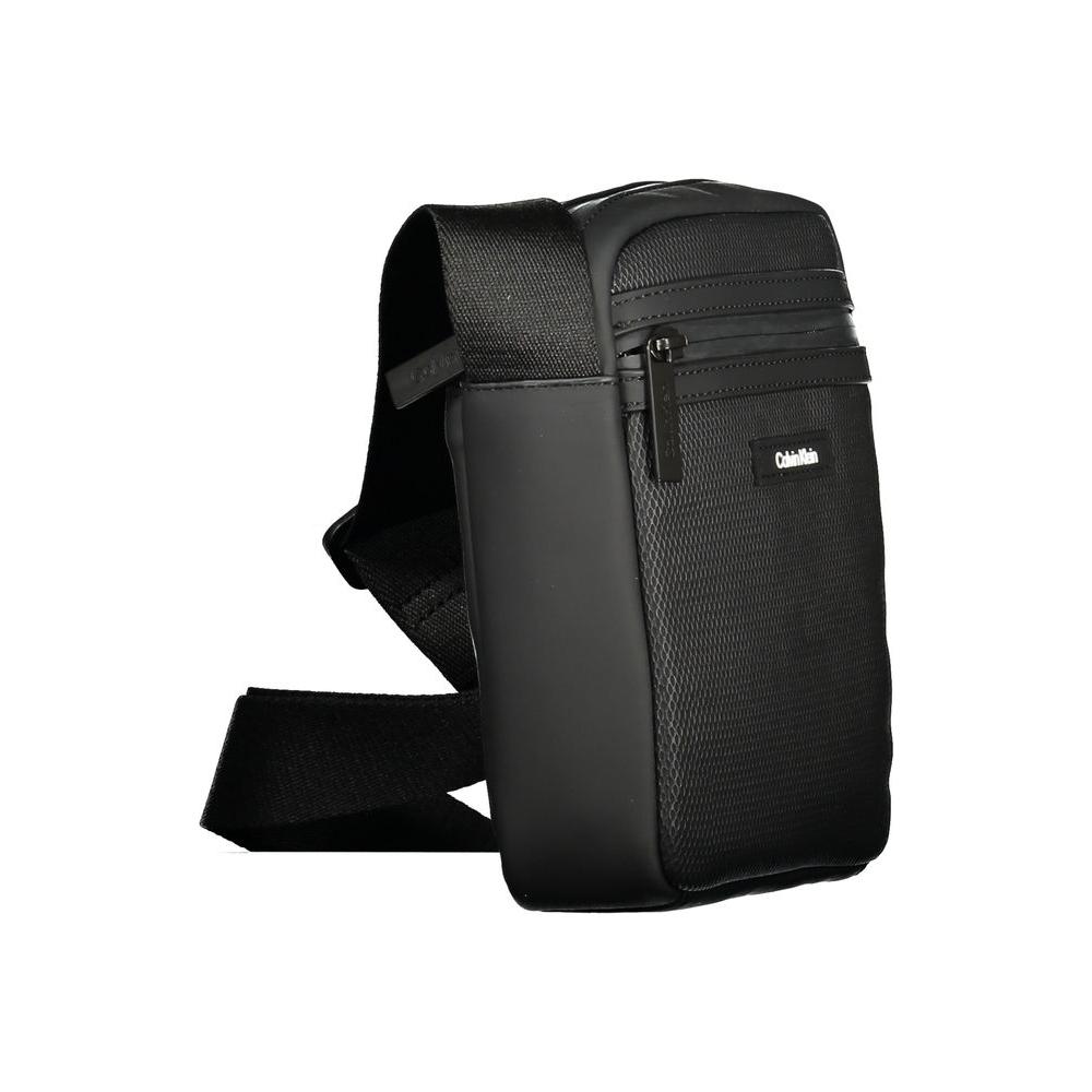 Calvin Klein black polyester men's shoulder bag with adjustable strap, external pockets, and signature logo detailing.