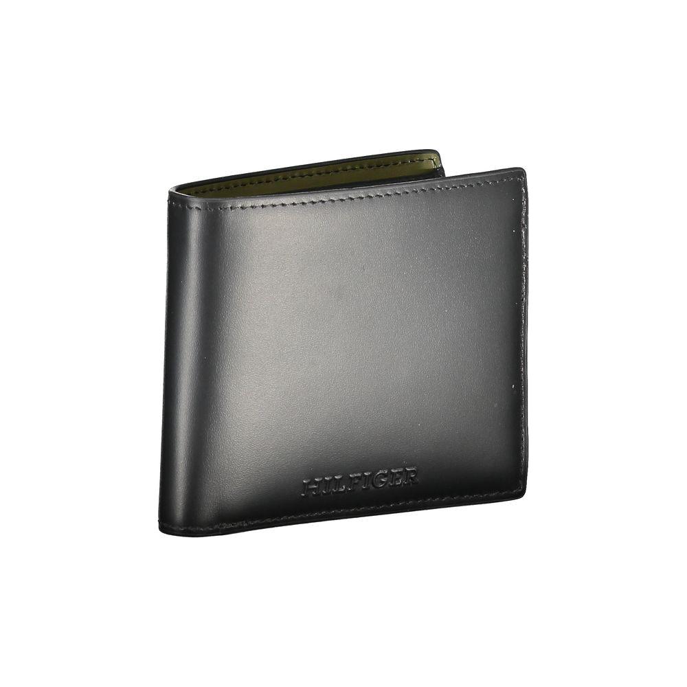 Tommy Hilfiger black leather wallet with two compartments, coin purse, card slots, contrasting details, and logo print.
