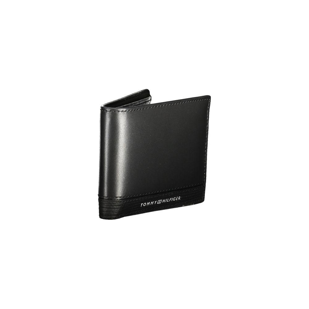 Tommy Hilfiger black leather men's wallet with sleek design and logo, perfect accessory for modern men seeking luxury and style.