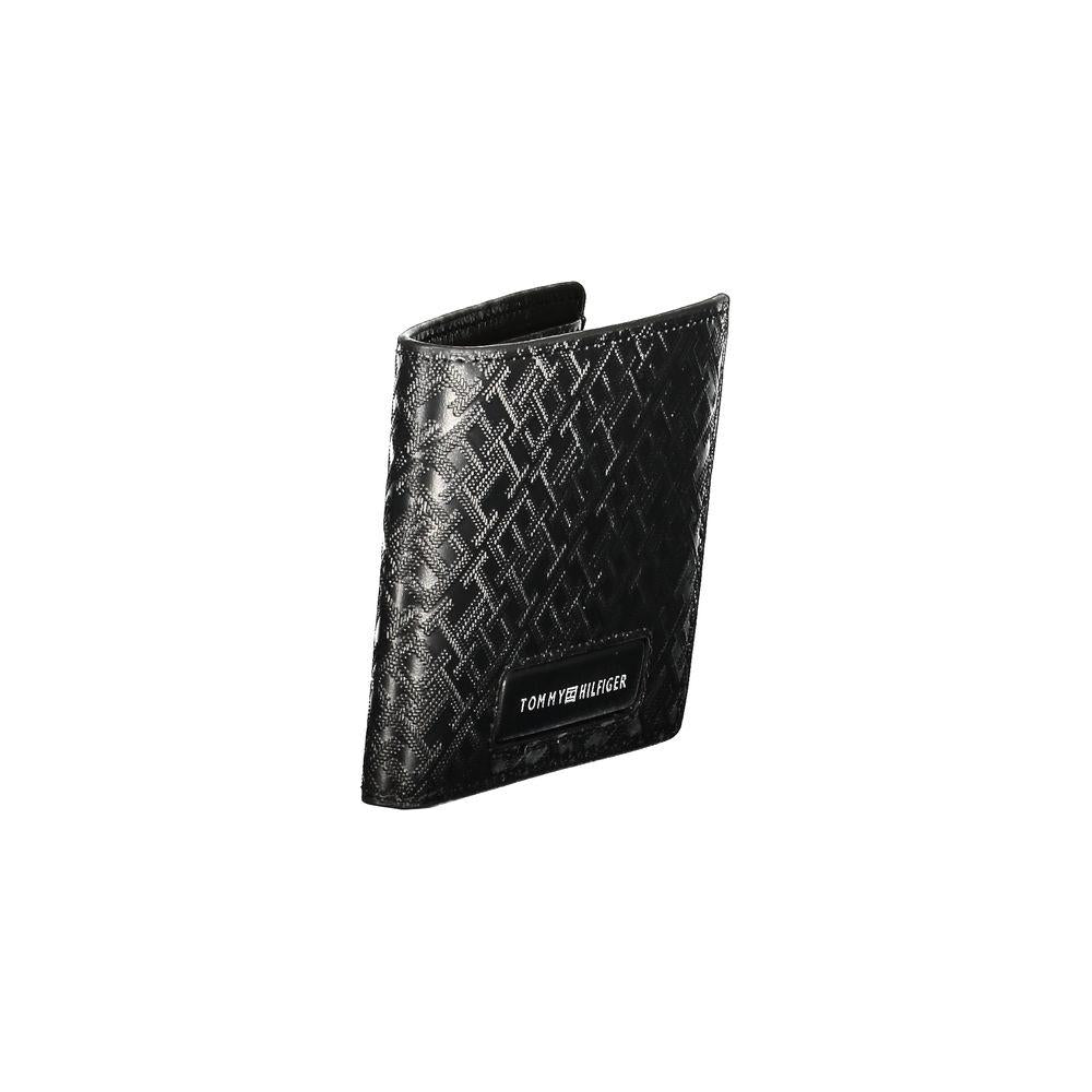 Tommy Hilfiger black leather men's wallet with sleek design, contrasting details, and branded logo. Premium accessory for stylish individuals.