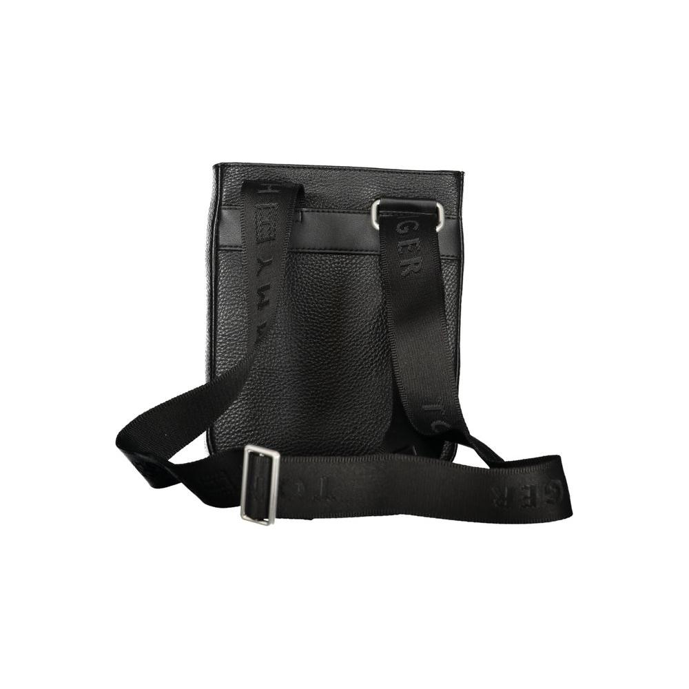 Tommy Hilfiger black polyethylene men's shoulder bag with adjustable strap and bold logo design.