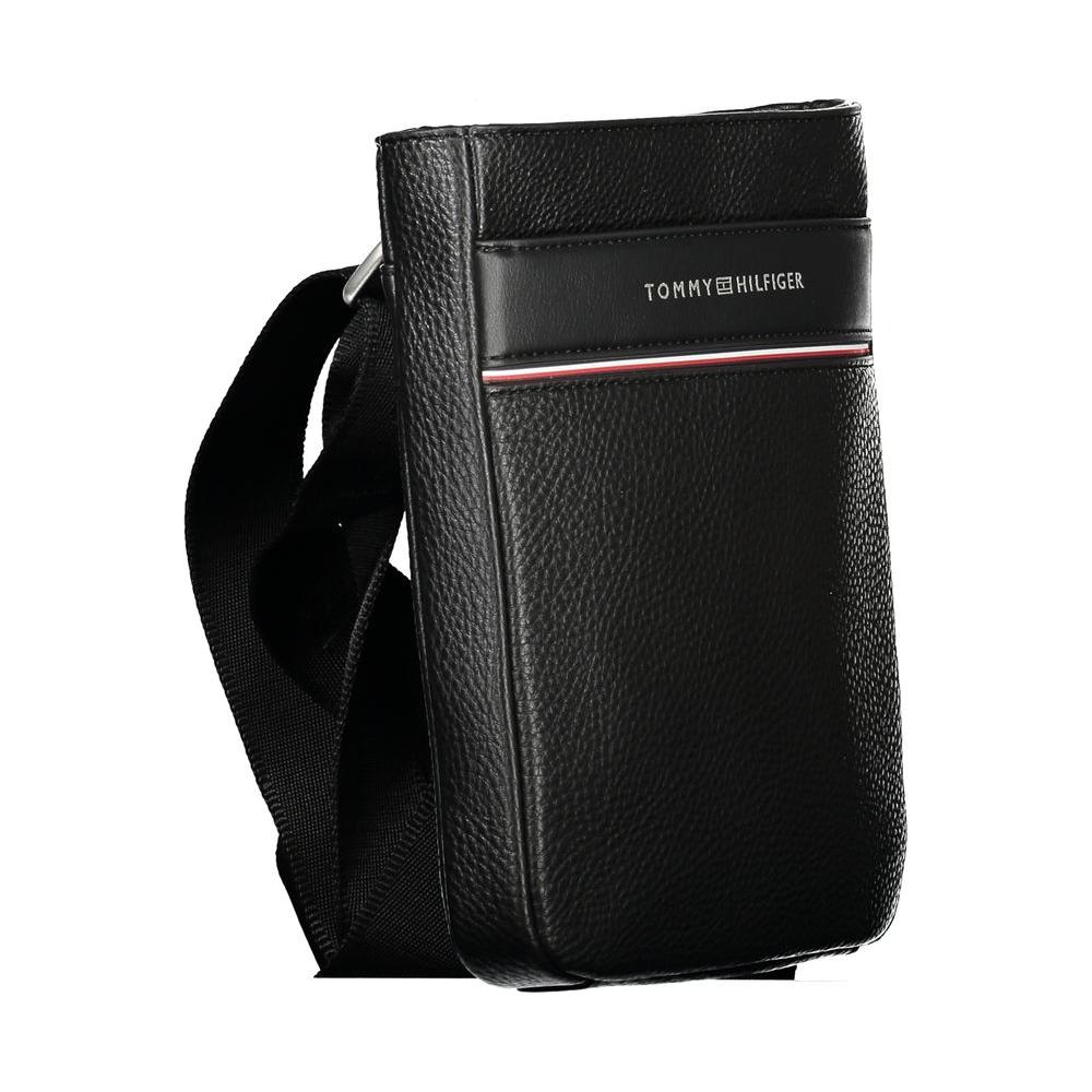 Tommy Hilfiger black men’s shoulder bag with adjustable strap and logo, featuring external pocket for easy access and style.