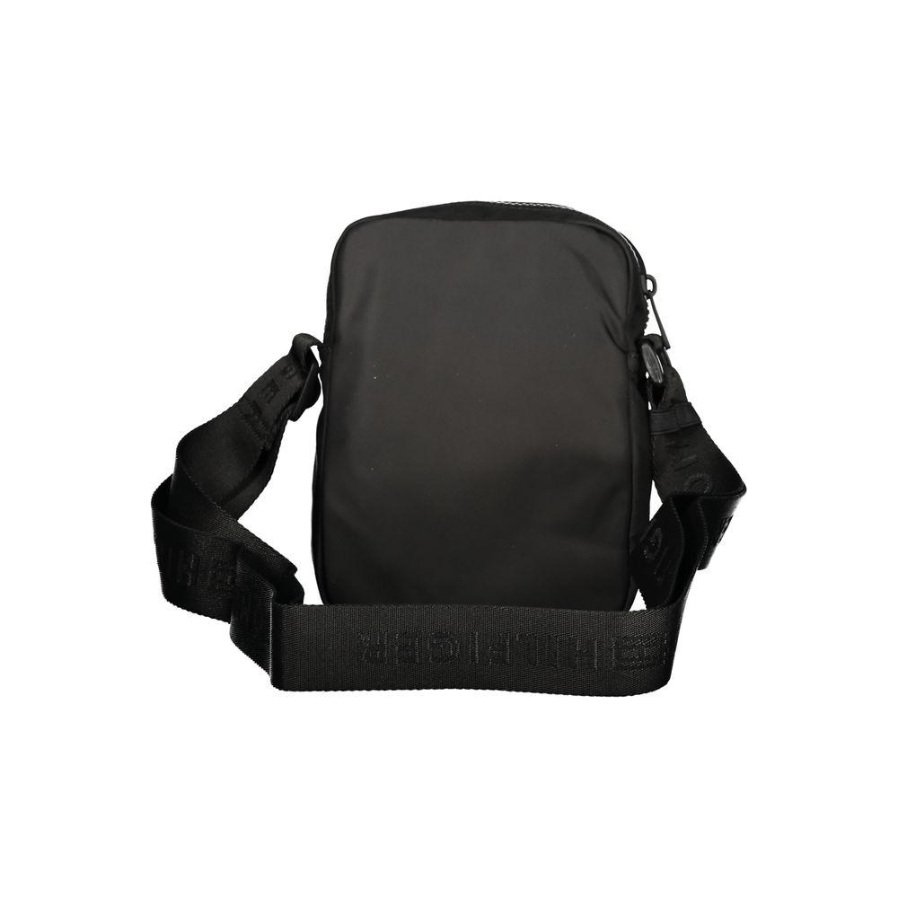 Tommy Hilfiger black shoulder bag with adjustable strap, made from 50% recycled polyester, showcasing sleek and functional design.