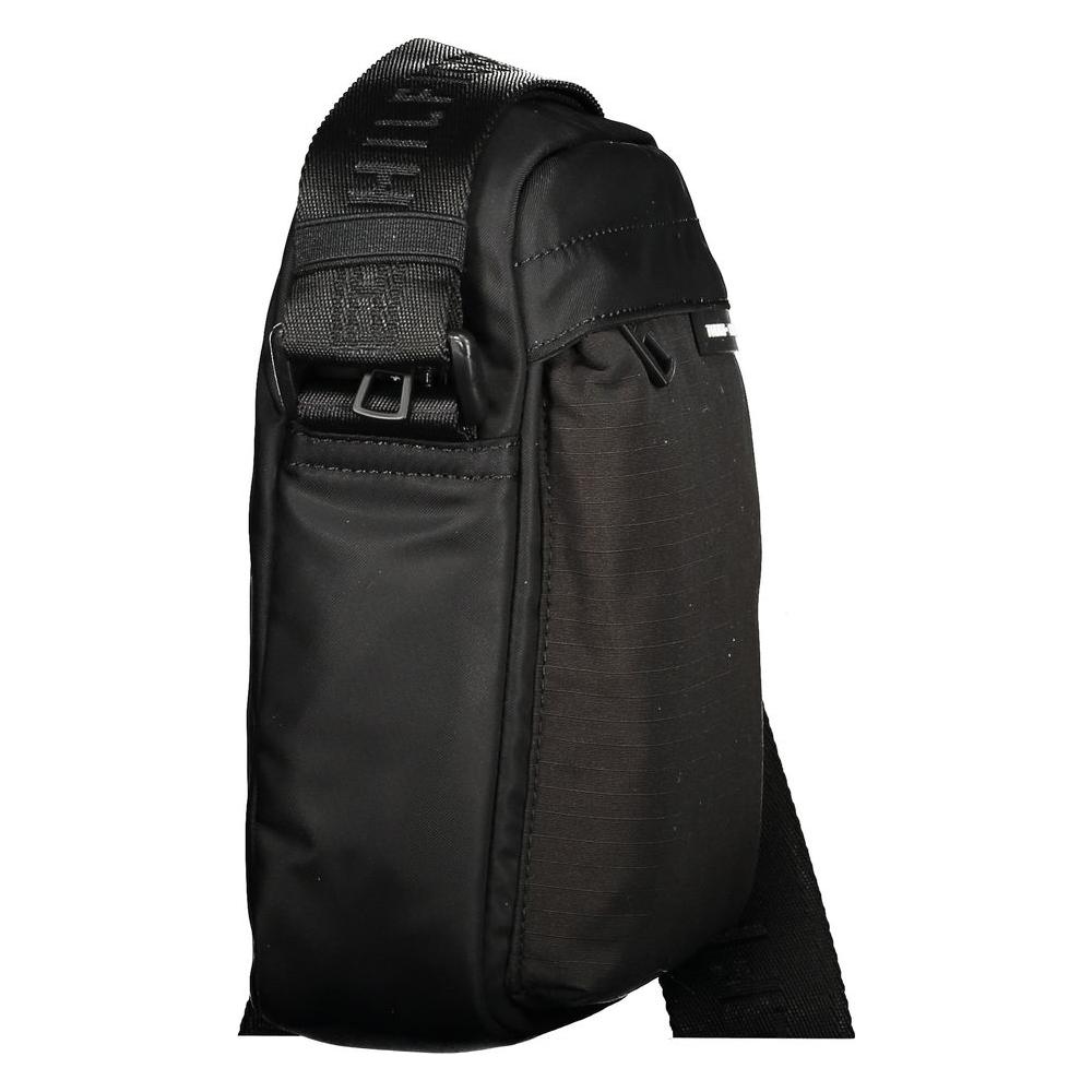 Tommy Hilfiger black recycled polyester men's shoulder bag with adjustable strap and sleek design for modern, eco-conscious style.
