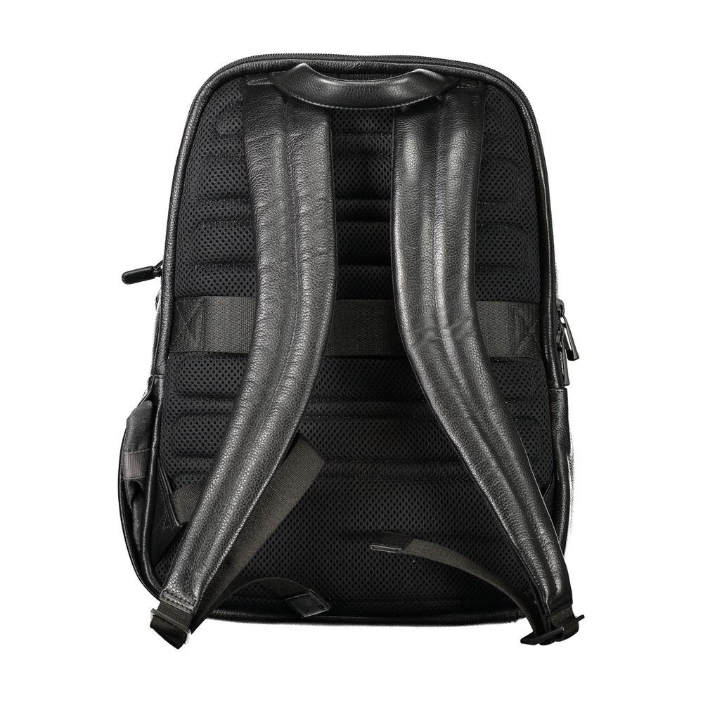 Back view of Piquadro black leather men's backpack with adjustable shoulder straps and ergonomic design for comfort and style.