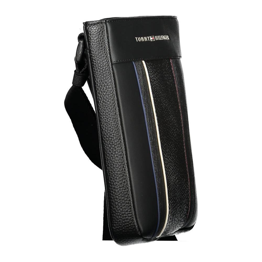 Tommy Hilfiger black men's shoulder bag with adjustable strap and contrasting details, sophisticated and stylish design.