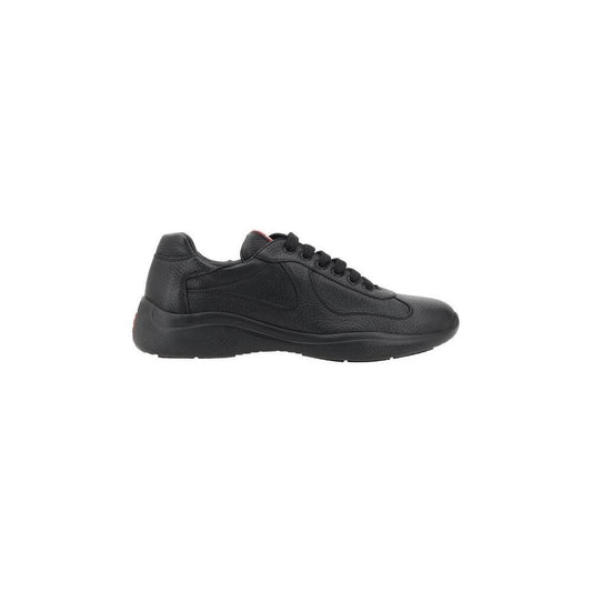 Prada Leather Sneakers with grained texture, front lace-up, round toe, and textured sole, featuring iconic monogram on the tongue.