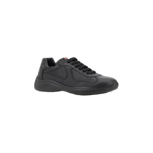 Prada leather sneakers with grained texture, lace-up closure, round toe for comfort, and iconic monogram on tongue.