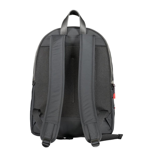 Back view of Tommy Hilfiger black polyester backpack with adjustable straps and handle, featuring mesh padding for comfort.