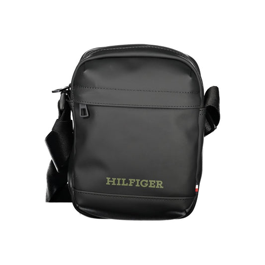 Tommy Hilfiger black polyethylene shoulder bag with adjustable strap and logo, featuring zip closure and pockets for storage.